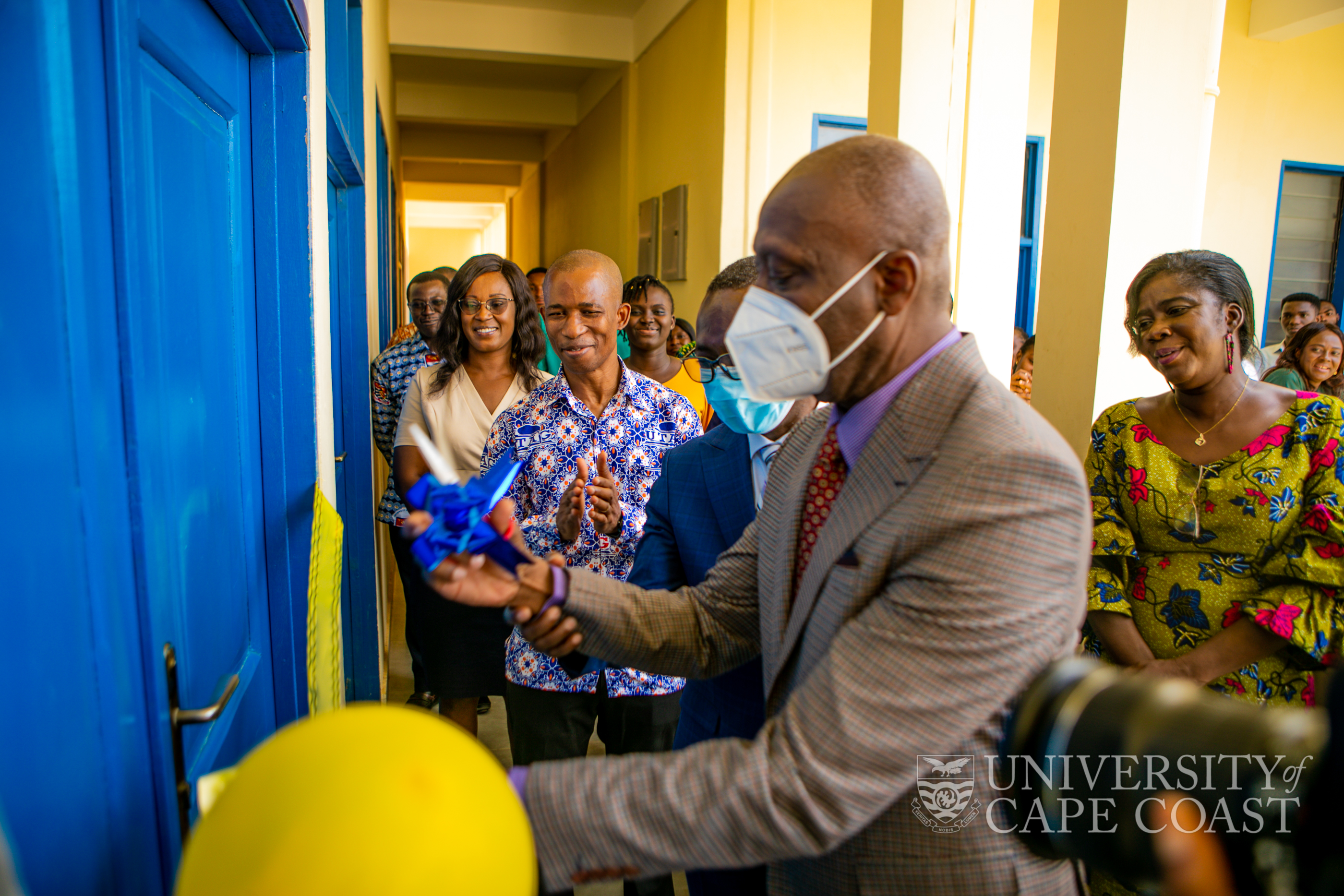 Registrar-UCC, Mr. Jeff Teye Onyame, being supported by the Vice-Chancellor, Prof. Johnson Nyarko Boampong to commission the lab