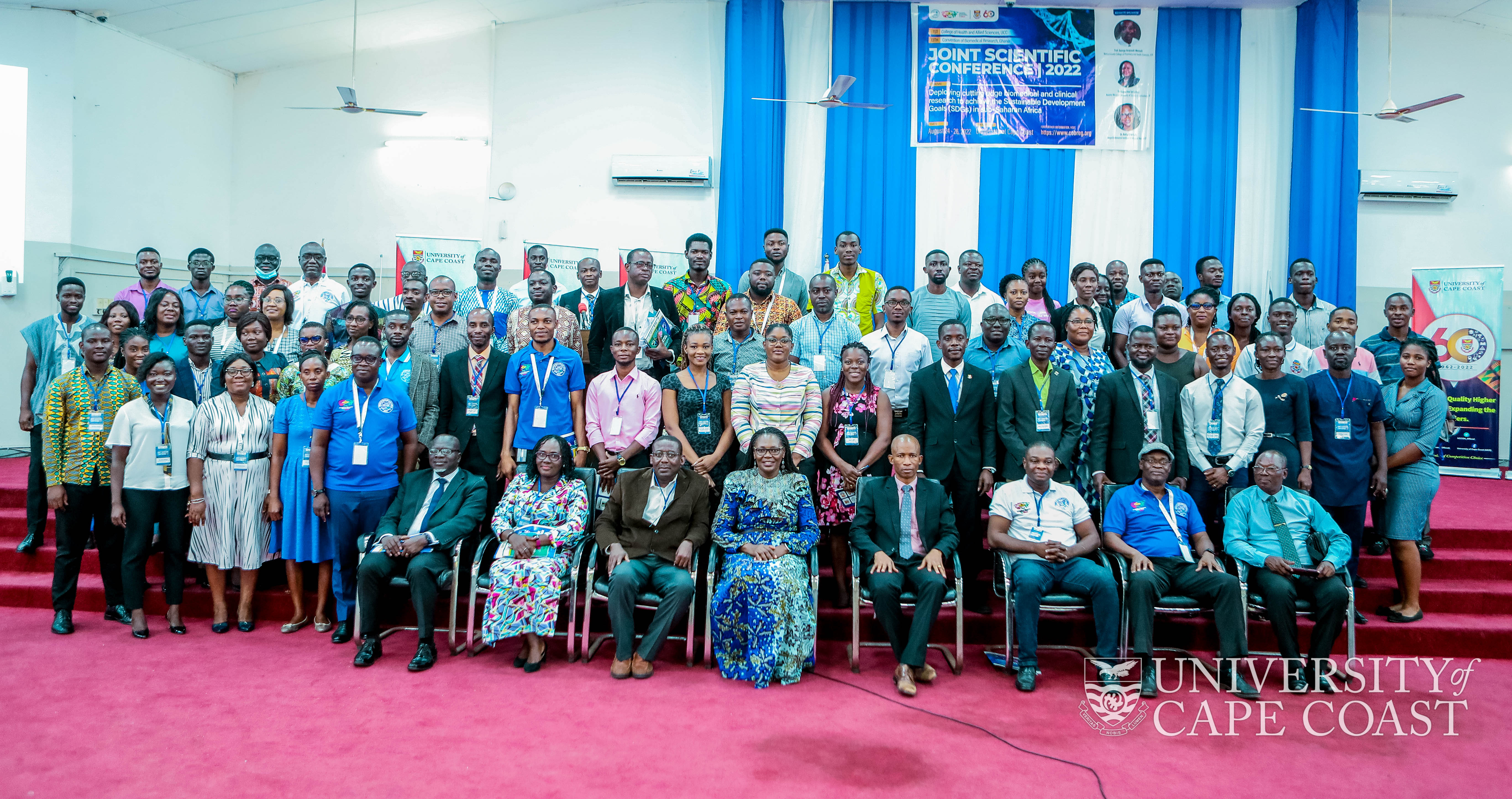 Group photo of speakers and participants in the conference