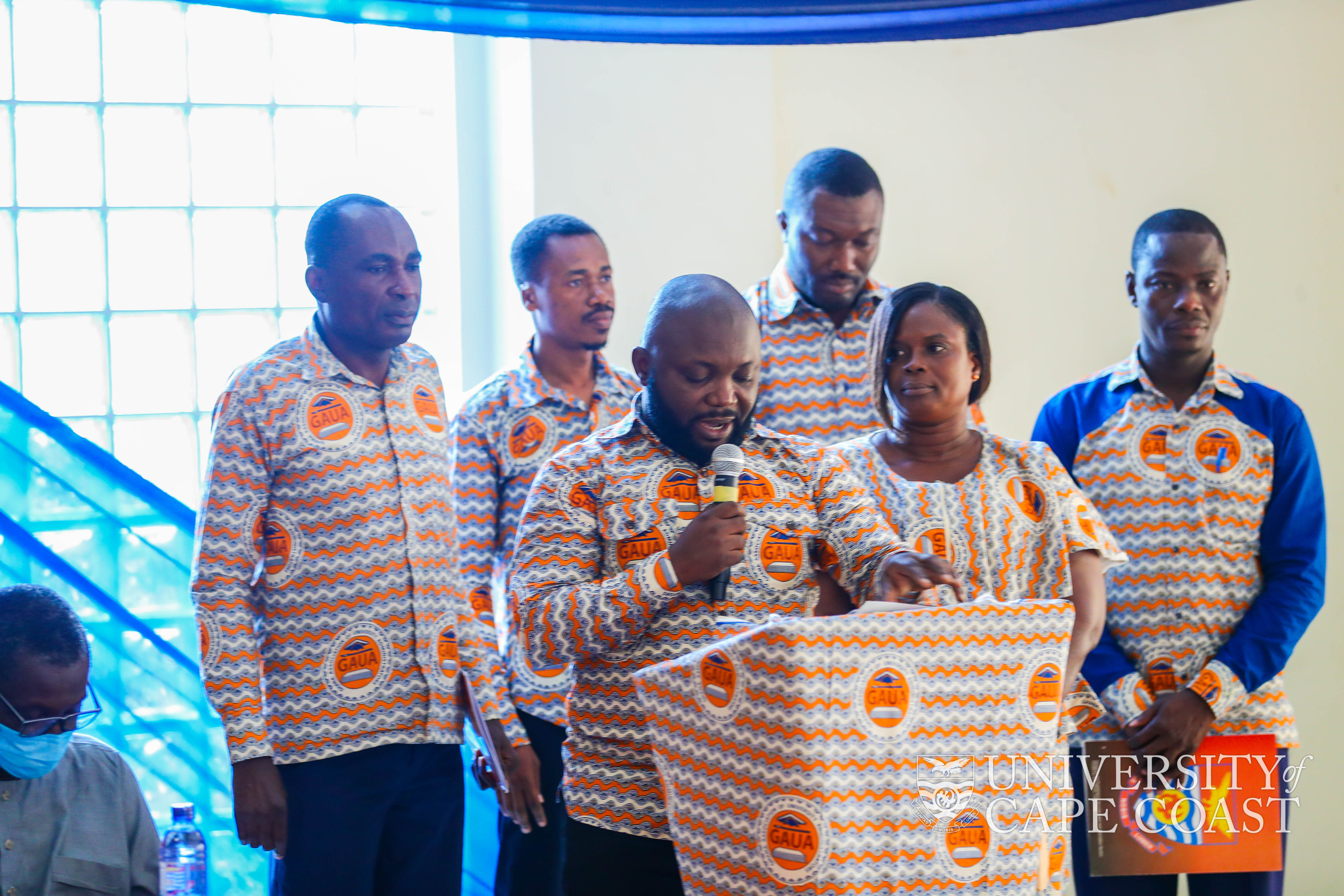 President of GAUA-UCC, Felix Adu-Poku, speaking at the swearing in ceremony. With him are the other executives.