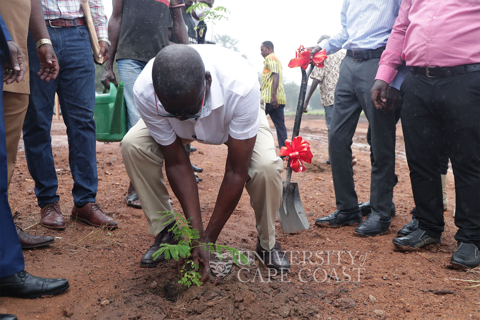 The CEO of GNPC, Dr Kofi Koduah Sarpong planting a tree during the sod-cutting ceremony