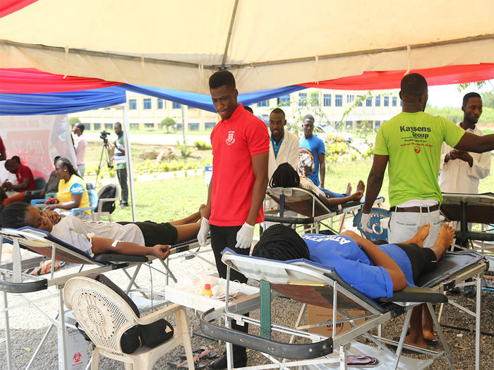 Some students donating blood at the programme Some students donating blood at the programme