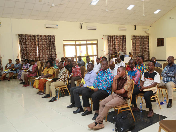 Participants listening to presentations at the workshop Participants listening to presentations at the workshop