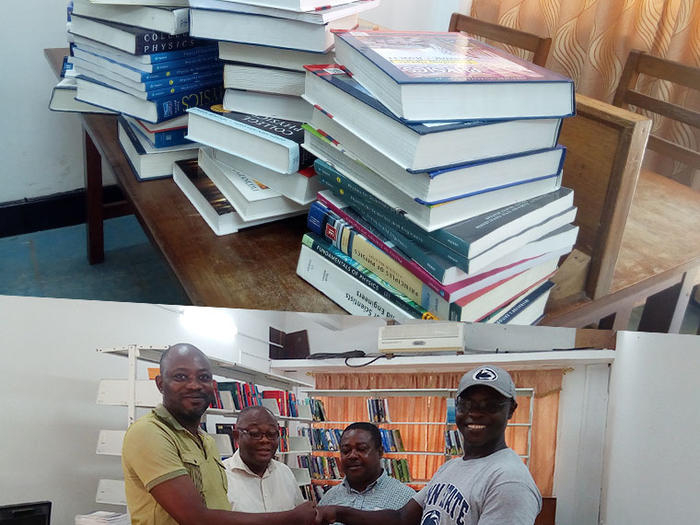 Prof. Kofi Adu donating the books to the Head , Department of Physics, Dr. George Amoako Presentation of Books to the Department of Physics